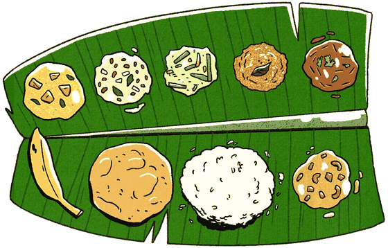 A traditional Onam Sadhya spread on a banana leaf